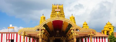 Golden entrance architecture of Nallur Kandaswamy Temple in Jaffna